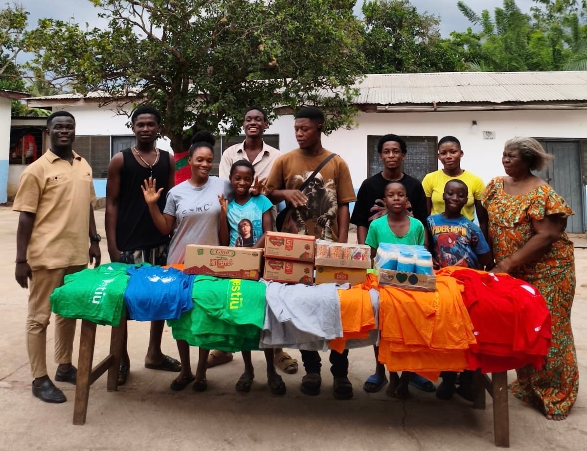 A donor supporting children through education and care